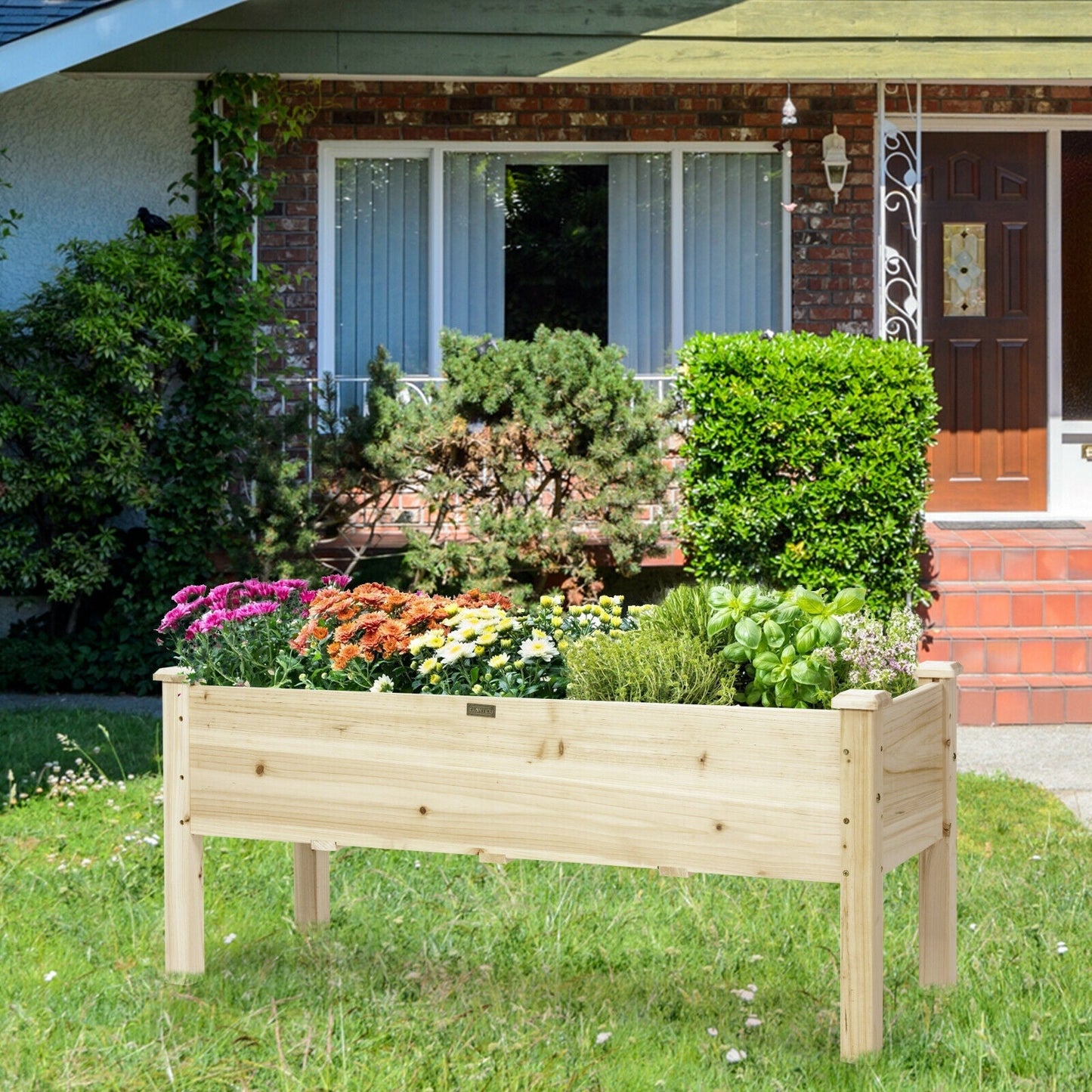 Raised wooden garden bed planter box on legs for vegetables with natural finish on Tampa Home & Garden Store