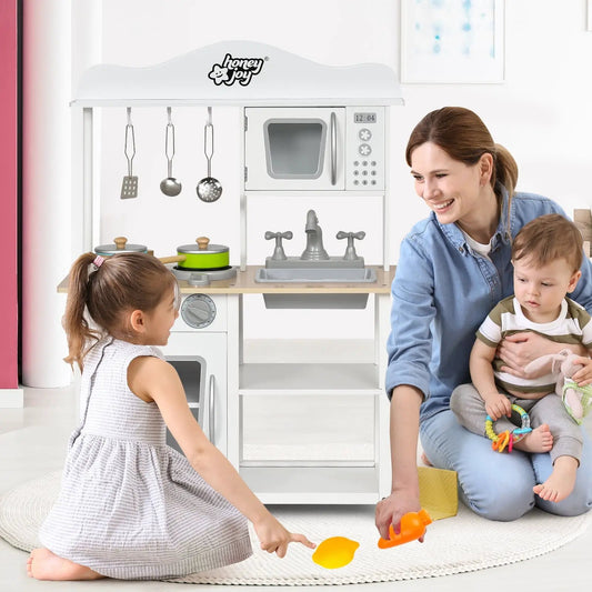White wooden pretend play kitchen with sink and utensils by Honey Joy on Tampa Home & Garden Store