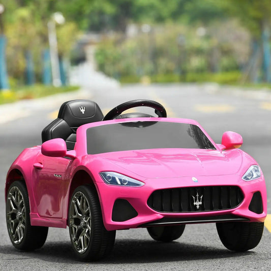 Pink 12V kids ride-on car with remote, Maserati-style grille badge and black interior on Tampa Home & Garden Store
