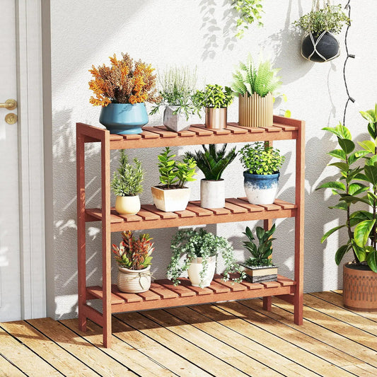3-Tier solid wood plant stand with slatted shelves holding potted plants on a deck on Tampa Home & Garden Store