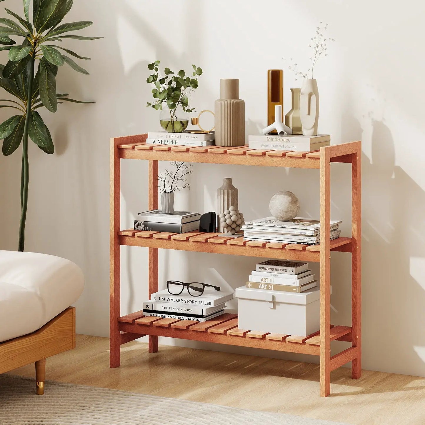 3-Tier wooden plant stand with slatted shelves in warm natural finish with books on top on Tampa Home & Garden Store