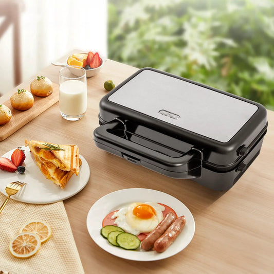 3-in-1 Sandwich Maker with Removable Plates, black body and silver lid on table on Tampa Home & Garden Store
