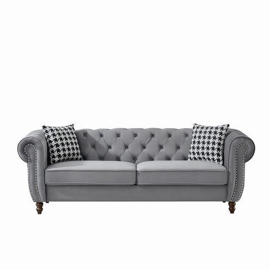 Chesterfield upholstery sofa with roll arms and nailhead trim in grey fabric; 2 pillows on Tampa Home & Garden Store