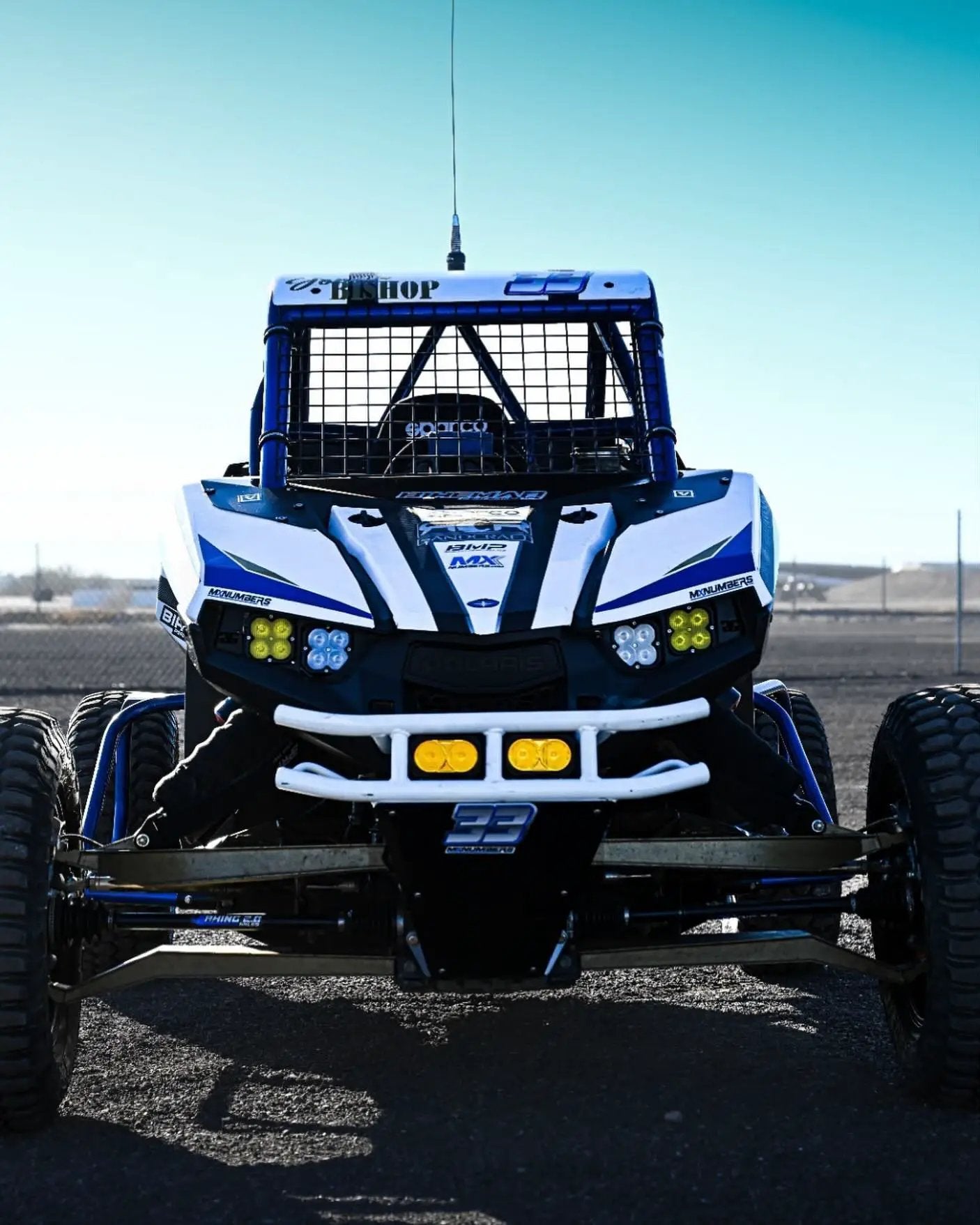 Race Series LED Pod for long-range lighting on blue and white off-road UTV with yellow LEDs on Tampa Home & Garden Store