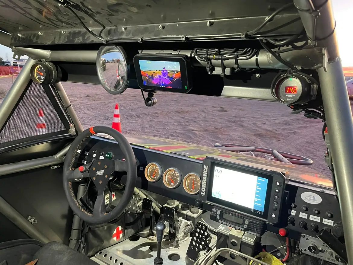 TrailVue Front and Rear Cam System with CarPlay in a race car cockpit, center touchscreen display on Tampa Home & Garden Store