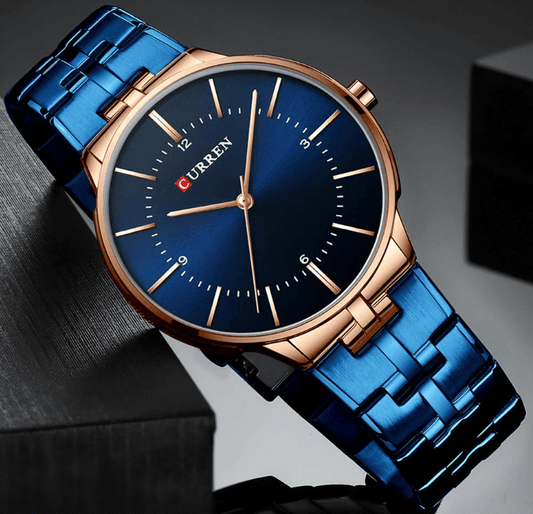Men's waterproof watch with blue dial and blue bracelet, rose-gold case and Curren logo on Tampa Home & Garden Store
