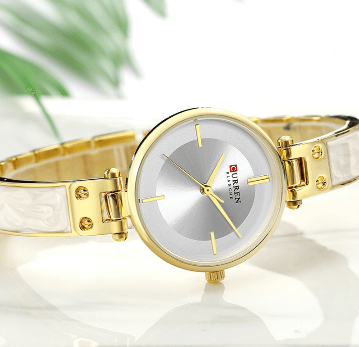 Stevvex womens stainless steel watch with ceramic marble bracelet, gold-tone case and silver dial on Tampa Home & Garden Store