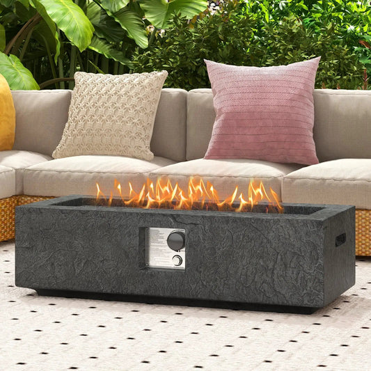 42.5 Fire Pit Table Set with Stainless Burner in dark gray finish beside beige outdoor sofa on Tampa Home & Garden Store