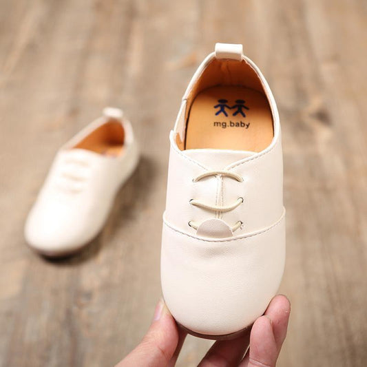 Stevvex pair of white leather baby shoes with lace-up design, casual walkers for boys and girls on Tampa Home & Garden Store