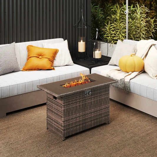 Propane fire pit table in brown rattan with stainless burner for outdoor lounge on Tampa Home & Garden Store