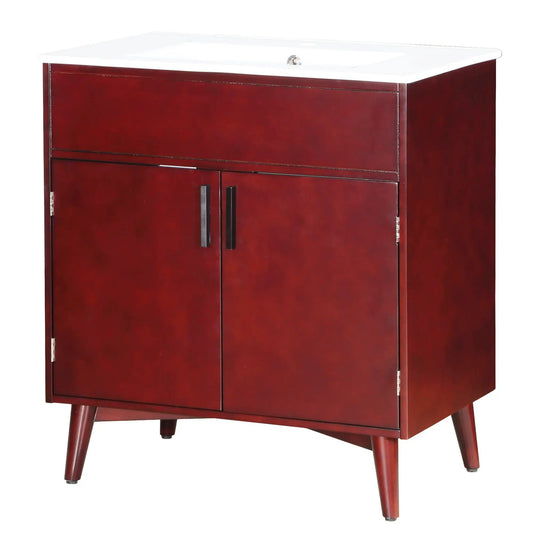 Bathroom vanity set with white countertop sink on dark cherry wood cabinet featuring two doors and tapered legs on Tampa Home & Garden Store