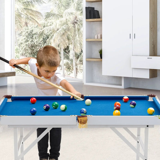 47 inch folding billiard table with blue felt, cues, and colorful balls; child playing indoors beside white modern cabinets on Tampa Home & Garden Store