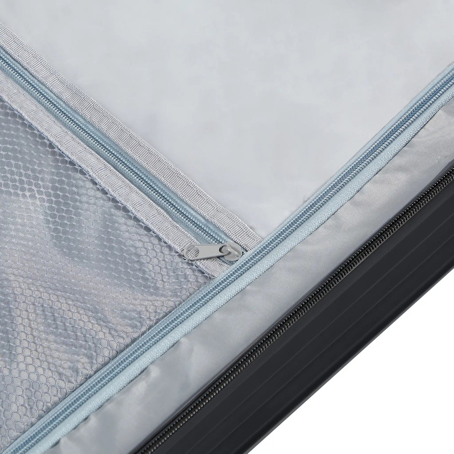 Four-piece luggage set interior zipper closeup in light gray fabric with mesh pocket VIP on Tampa Home & Garden Store