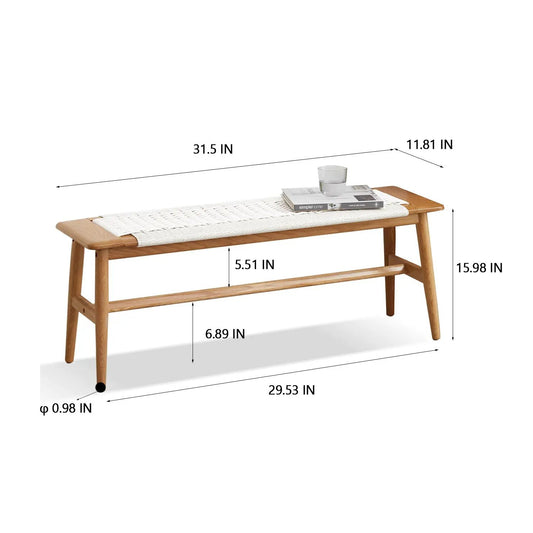 Natural oak wood dining bench with a white woven top and tapered legs on Tampa Home & Garden Store