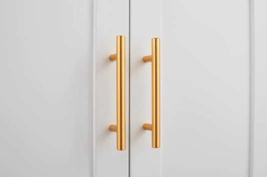 White metal tall kitchen cabinet doors with gold bar pulls by VIP Digital Presence on Tampa Home & Garden Store