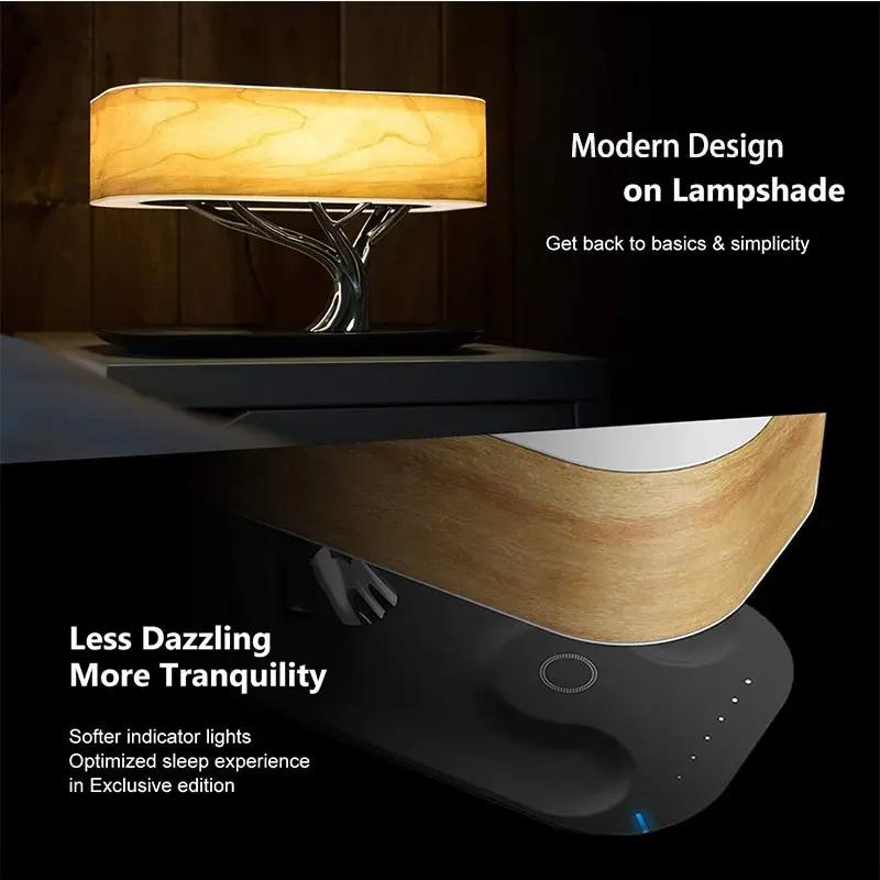 Dimmer LED table lamp with Bluetooth speaker, wood shade and sculpted metal base on dark display on Tampa Home & Garden Store