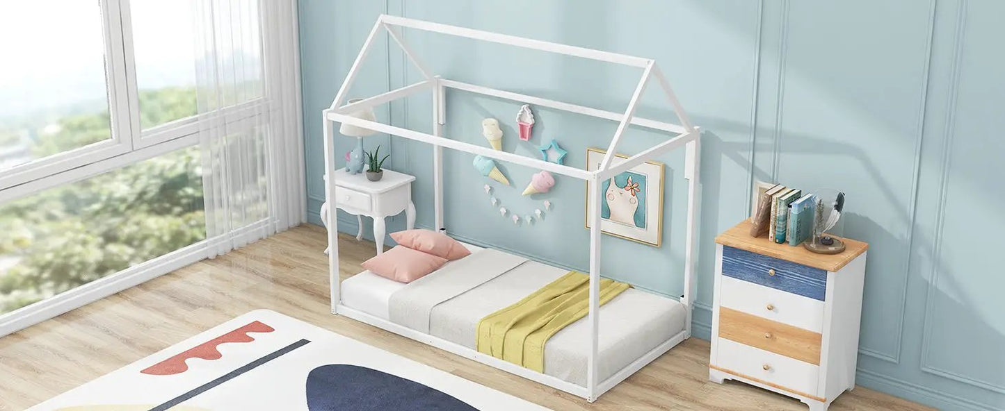 Twin white metal house-shaped platform bed and dresser on Tampa Home & Garden Store