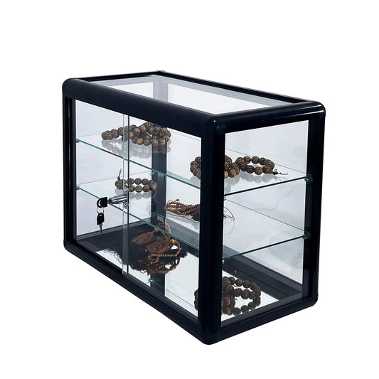 Tempered glass display case with sliding door, black frame, 3 shelves displaying jewelry on Tampa Home & Garden Store