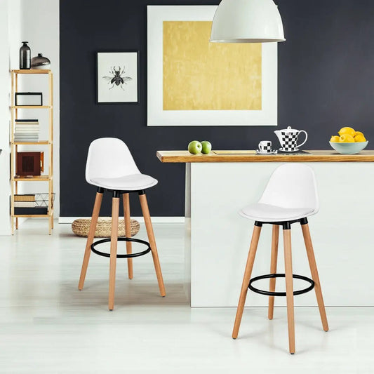 2-piece mid century barstools with white seats and natural wood legs at a kitchen island on Tampa Home & Garden Store