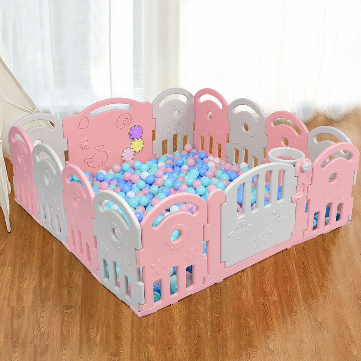 Plastic kids' ball pit playpen with pink and gray panels and pastel balls on Tampa Home & Garden Store
