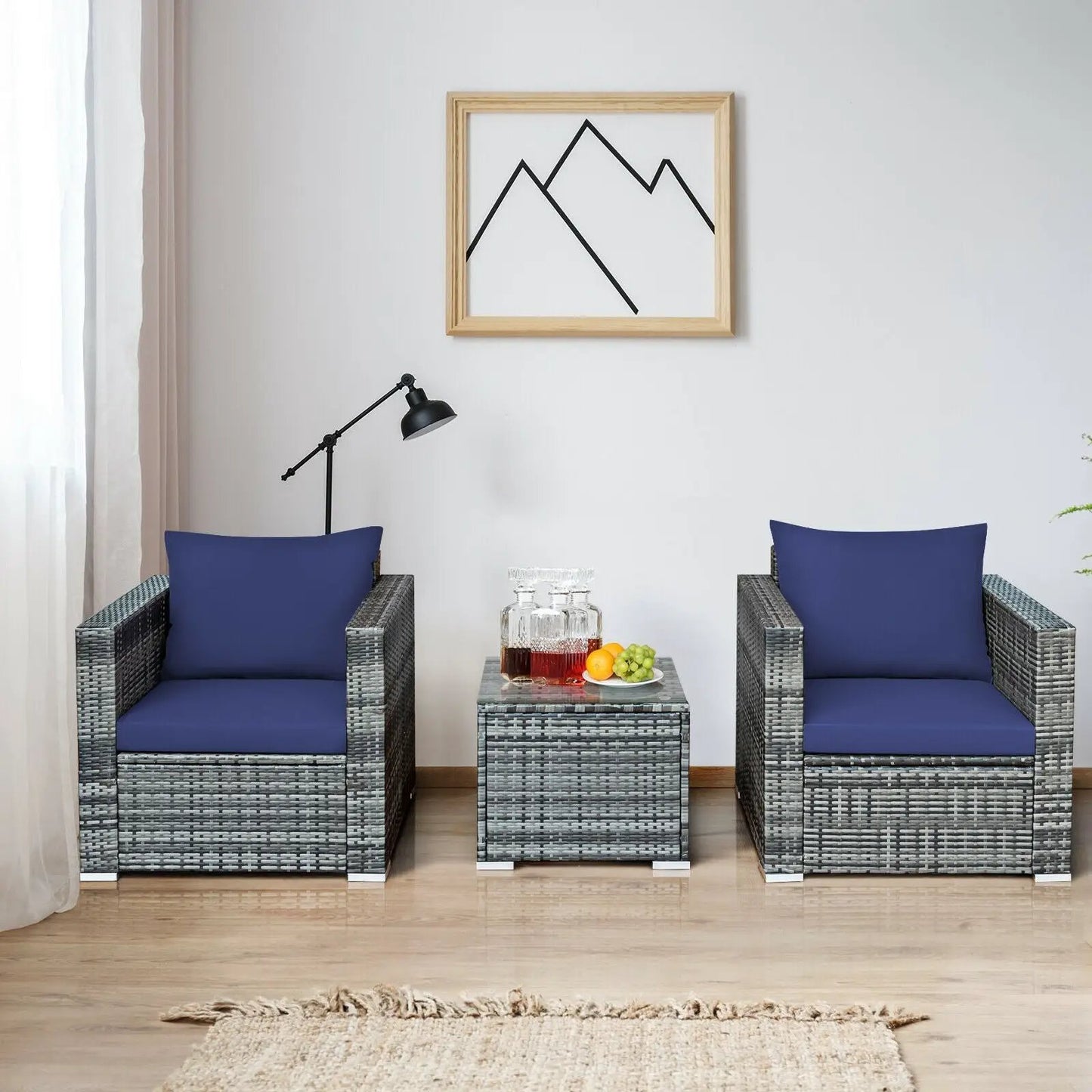 Outdoor movable grill table for 18/22 inch Weber kettle in gray wicker with blue cushions on Tampa Home & Garden Store