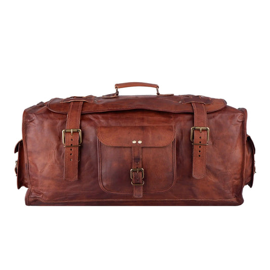 Bruno Flap Duffel Bag in vintage goat leather with brass buckles and top handle on Tampa Home & Garden Store