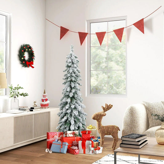 4 ft DirectDeals pre-lit snow-flocked slim Christmas tree in a bright living room with gift-wrapped presents on Tampa Home & Garden Store