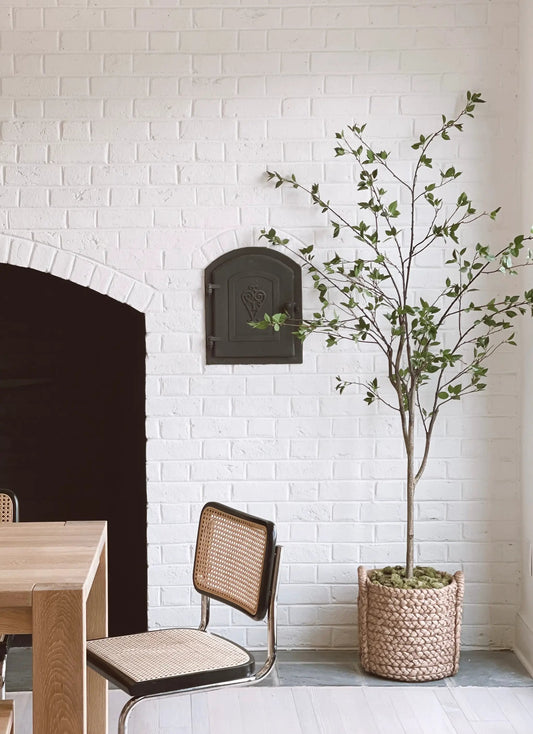 Five Foot Minimalist Citrus Artificial Tree by Nearly Natural with green foliage in a woven basket on Tampa Home & Garden Store