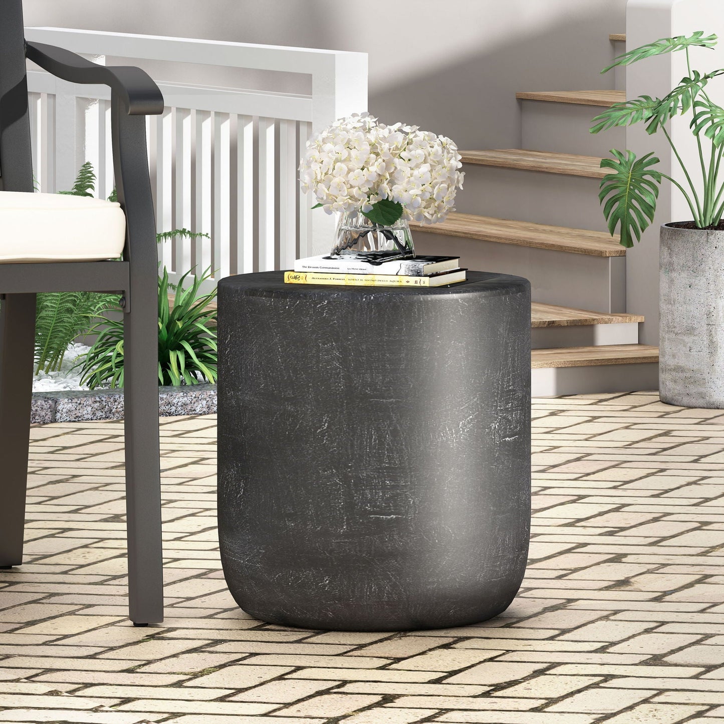 Outdoor lightweight concrete end table matte black with natural texture cylindrical shape on Tampa Home & Garden Store
