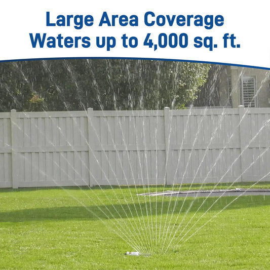 Pro Series 4000 Sq Ft Metal Gear-Drive Sprinkler hose-end sprays arcs across lawn by fence on Tampa Home & Garden Store