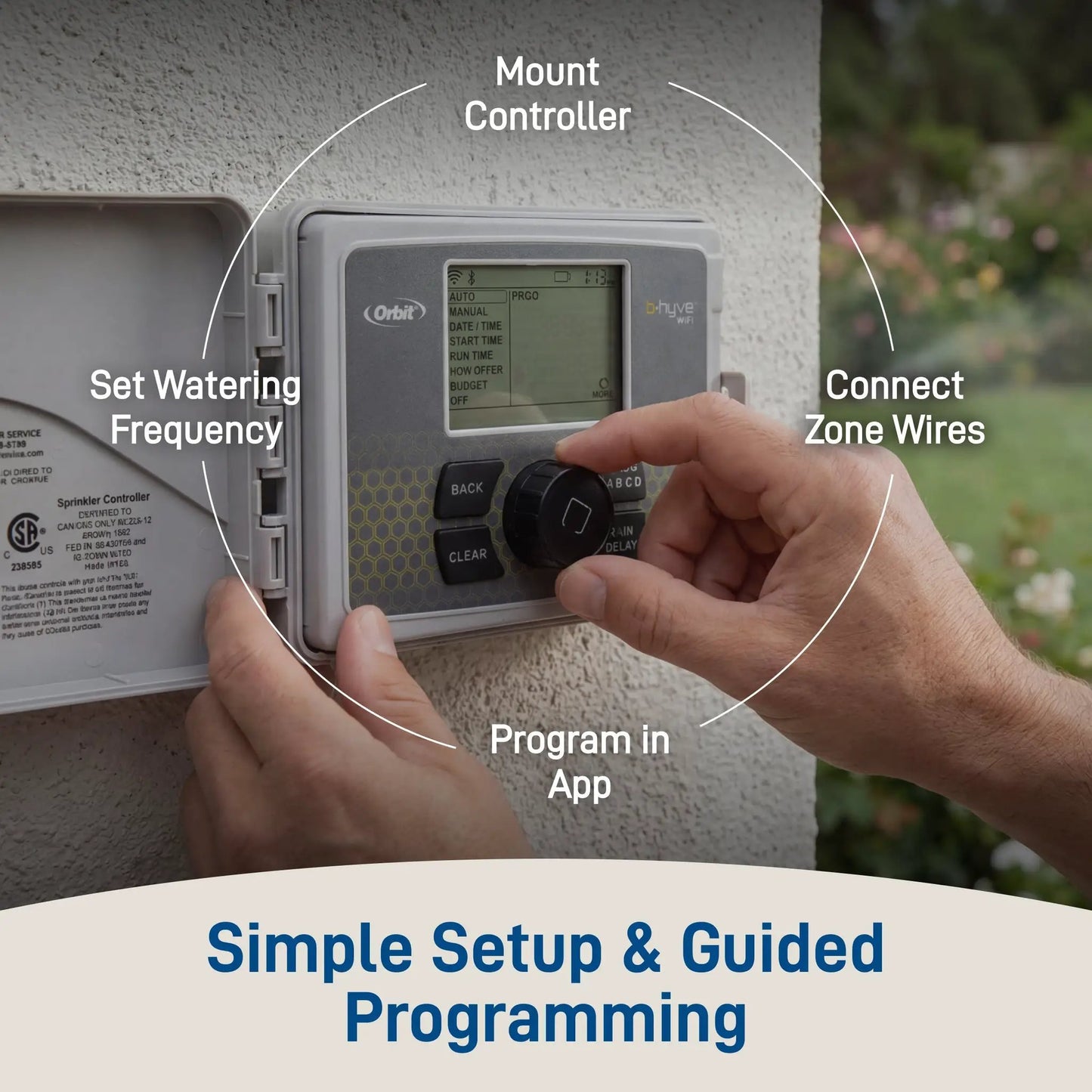 B Hyve 6 Zone Sprinkler Controller with WiFi on gray stucco wall Orbit logo LCD display on Tampa Home & Garden Store