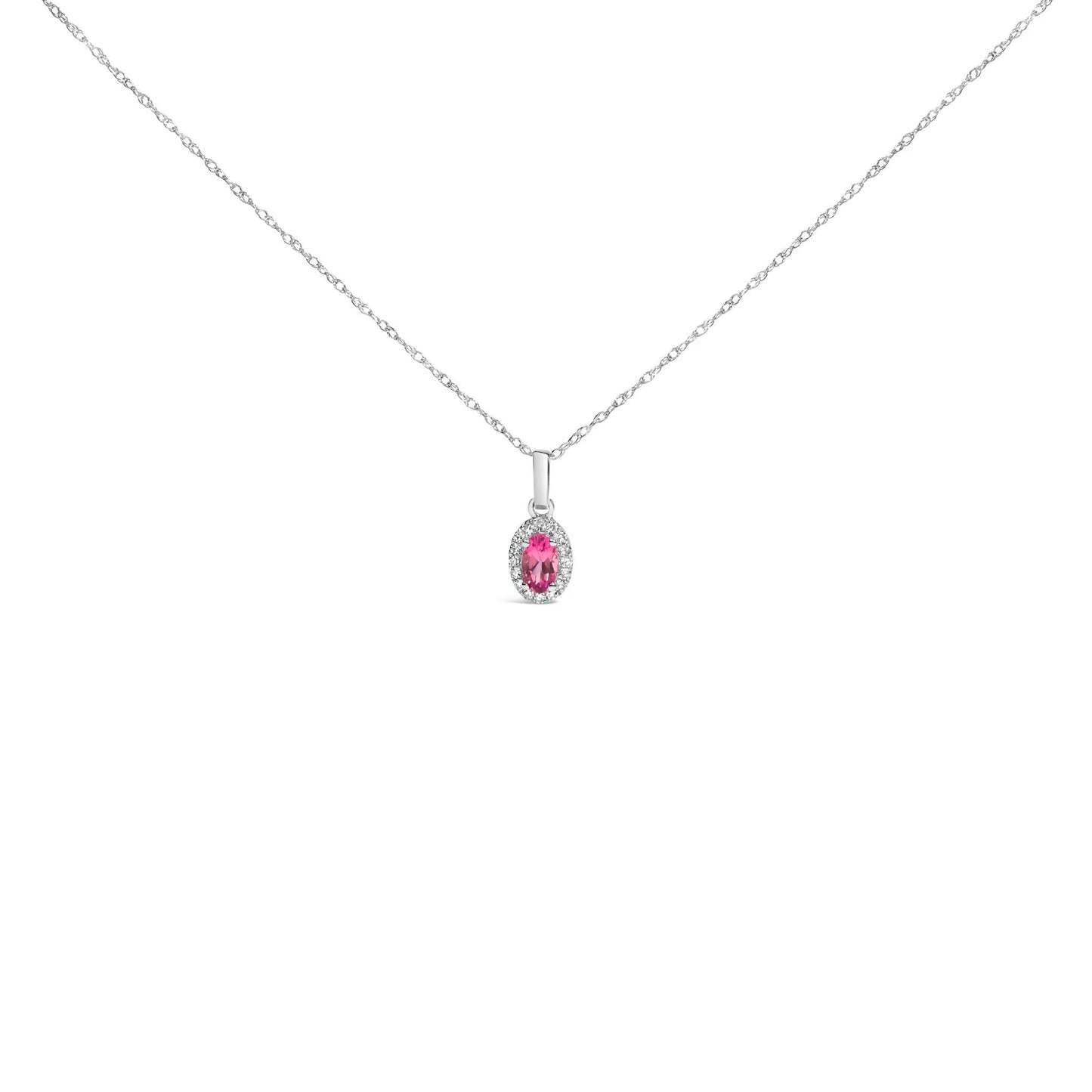 10K white gold emerald and diamond halo pendant by Bids with gemstone framed by diamonds on Tampa Home & Garden Store