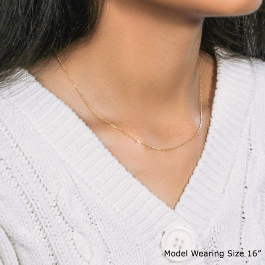 18k yellow gold diamond-cut cable link chain necklace 0.80 mm by Bids.com worn by model size 16 on Tampa Home & Garden Store