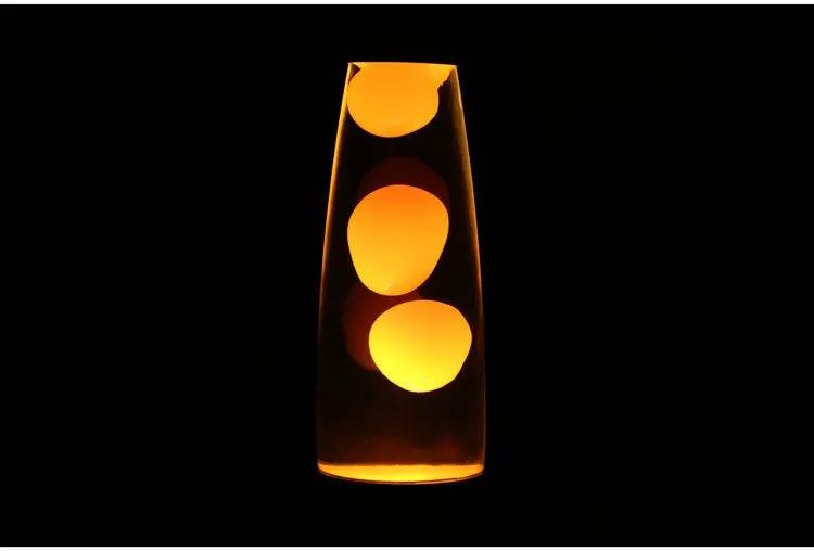 Small night light lava lamp decoration by Decorbites in clear glass with three orange blobs on Tampa Home & Garden Store