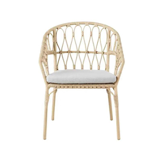 Outdoor dinner chair with beige wicker frame, woven back and light gray cushion on Tampa Home & Garden Store