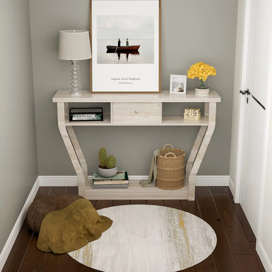 Curved frame console table with storage drawer in light wood, lamp and yellow flowers on Tampa Home & Garden Store