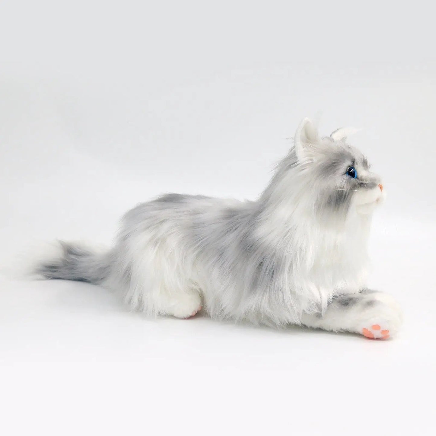 Chongker weighted life-size plush gray and white cat with blue eyes and pink paw pads on Tampa Home & Garden Store