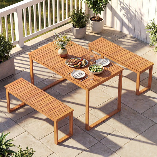 Acacia wood dining table with slatted tabletop and benches in natural finish on a patio on Tampa Home & Garden Store