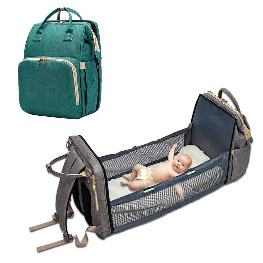 Moms and Dads Convertible Diaper Bag Backpack Bed in teal, bassinet, two items on Tampa Home & Garden Store
