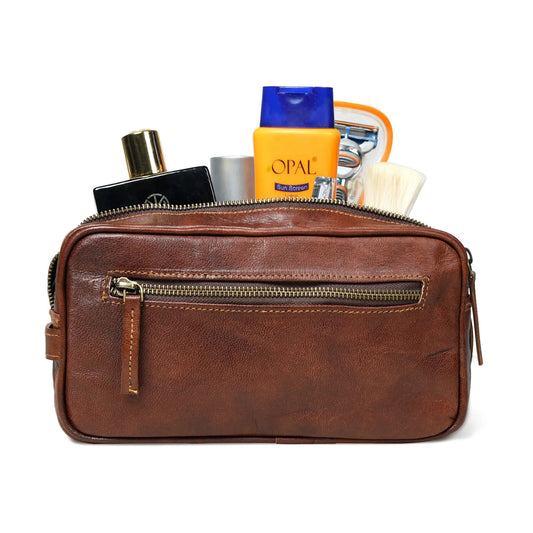 Twin Section Toiletry Bag brown leather with open zipper revealing cosmetics and sunscreen on Tampa Home & Garden Store