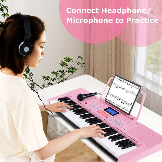 61-key pink beginner electric piano keyboard with headphones and sheet music on tablet on Tampa Home & Garden Store