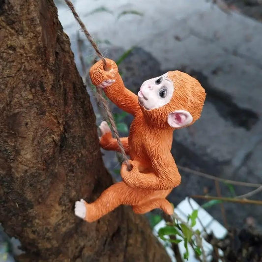 Outdoor Climbing Little Monkey Flower Pot Hanger orange monkey ornament gripping a rope on a tree on Tampa Home & Garden Store
