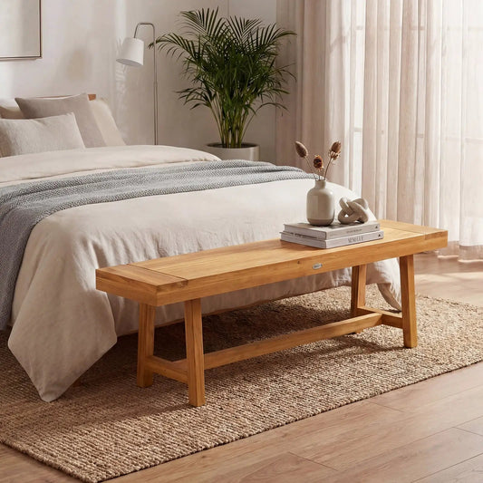 63 Inch Teak Wood Bench for up to 3 people, natural solid wood at the foot of a neutral bedroom on Tampa Home & Garden Store