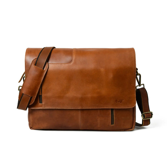 Wilson tan leather crossbody bag with adjustable strap and front zipper pocket on Tampa Home & Garden Store