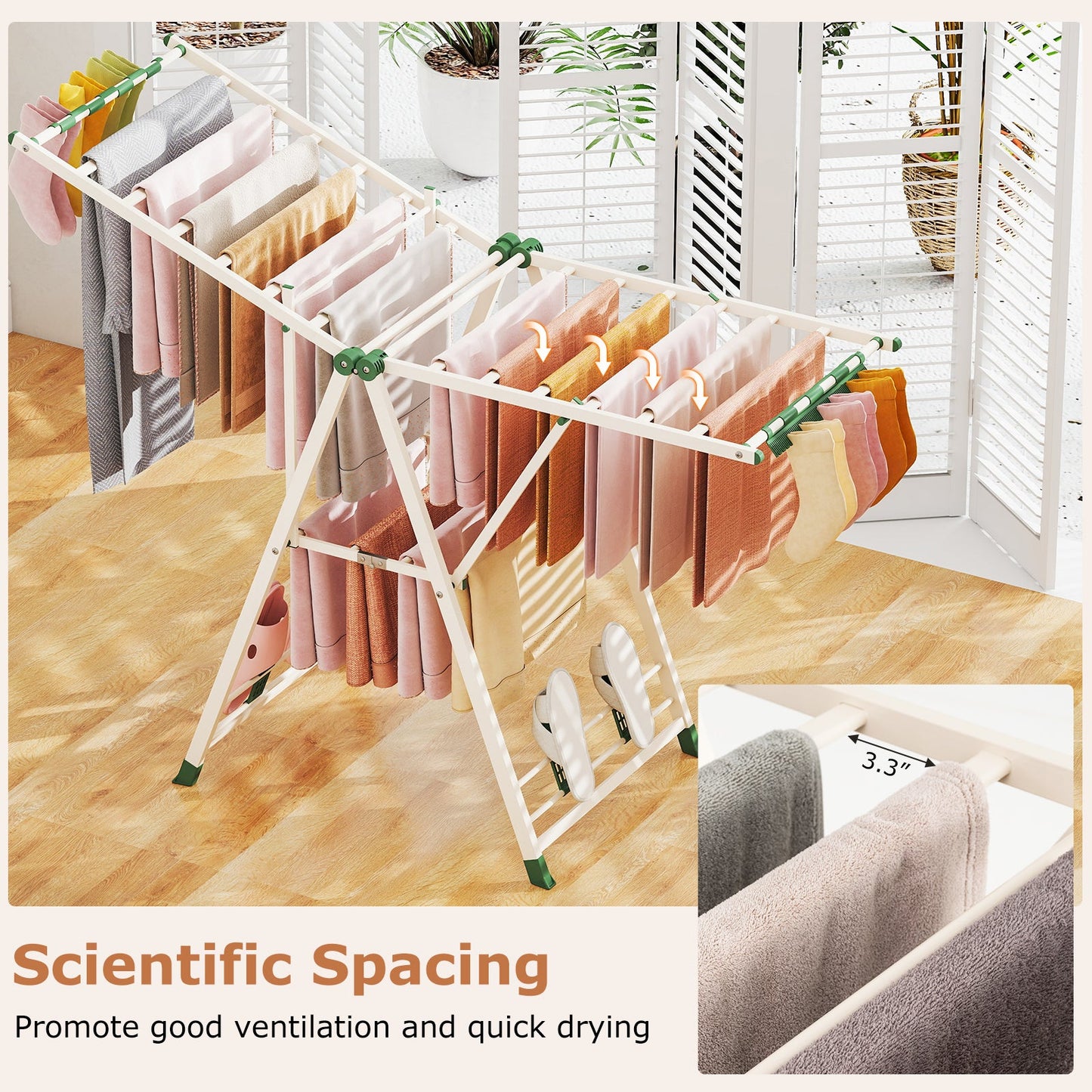 64 Inch Clothes Drying Rack with Adjustable Wings, white frame and green connectors on Tampa Home & Garden Store