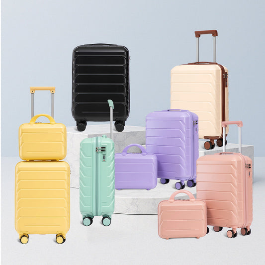 Beige ABS spinner luggage collection with pastel yellow mint lavender peach suitcases on Tampa Home & Garden Store