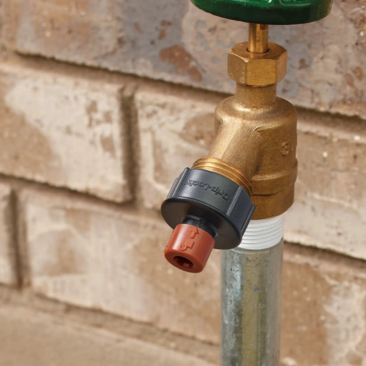 3/4 in faucet FHT to 1/4 in Drip-Lock adapter on brass irrigation valve Orbit Irrigation on Tampa Home & Garden Store