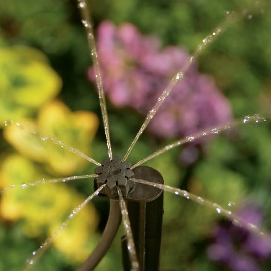 Quarter Inch Barb Multi-Stream Emitter on Stake Orbit Irrigation, black plastic drip stake on Tampa Home & Garden Store
