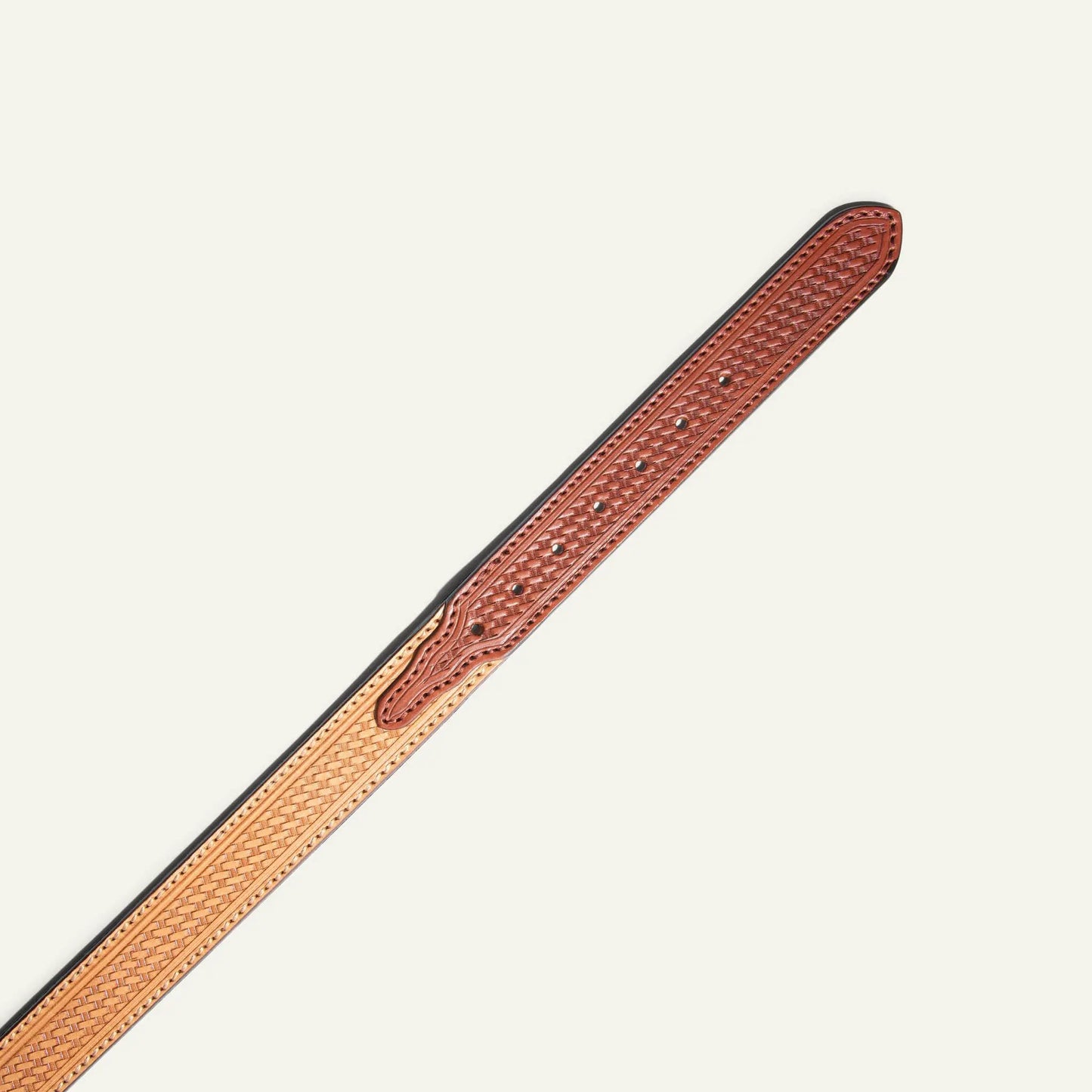 Hand tooled basketweave leather belt in warm reddish-brown with dark edge stitching on Tampa Home & Garden Store