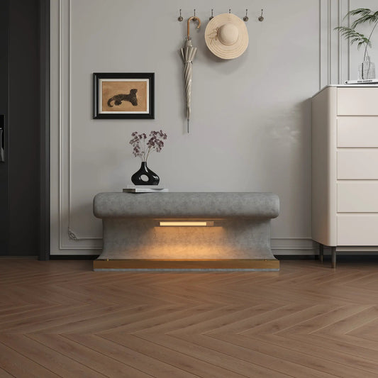 Leather entryway bench with LED sensor light, gray upholstered ottoman by wall hooks on Tampa Home & Garden Store